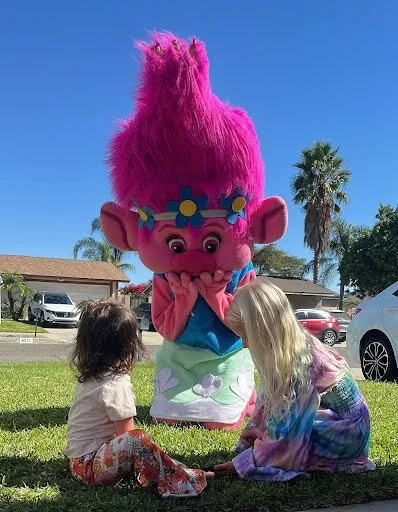 Pink Troll party character in Boston